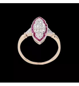 Anello in oro rosa diamanti e rubini.