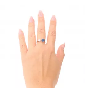 Bague en or gris saphir et diamants