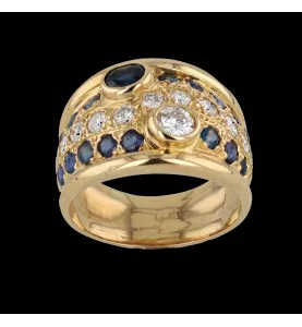 Yellow gold sapphire and diamond ring