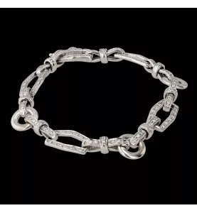 Armband Knoten aus Graugold mit Diamanten.