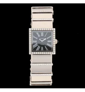 Montre Chanel Demoiselle or gris et diamants