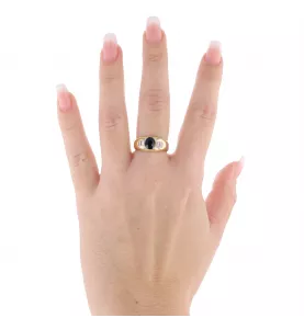 Anello con zaffiro e diamante in oro giallo