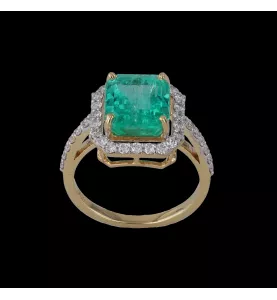 Yellow gold emerald and diamond ring