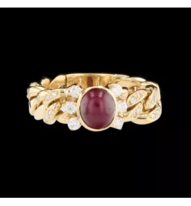 Anello con diamante e rubino in oro giallo